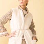 gilet con pelo riciclato e tasche giotta
