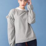 felpa con frappe e rouge sulla manica giotta