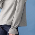 felpa con frappe e rouge sulla manica giotta