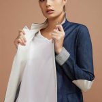 giacca con toppe sul gomito. Lo spacco alto sul dietro, caratterizza in modo particolare la linea Giotta realizzata il denim